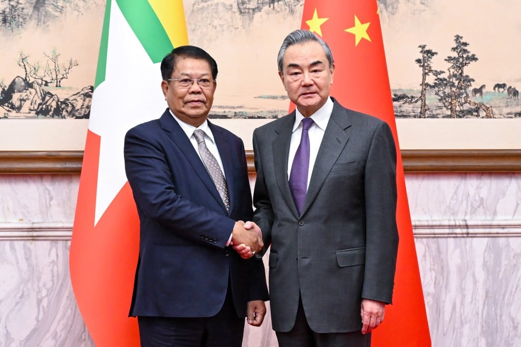 China’s top diplomat Wang Yi (right) meets Myanmar’s Deputy Prime Minister and Foreign Minister Than Swe in Beijing on Wednesday. Photo: Xinhua