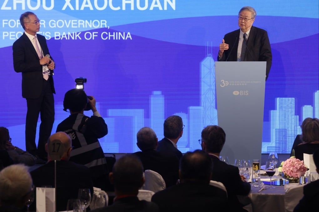 Hong Kong Monetary Authority Chief Executive Eddie Yue Wai-man (left) and former People’s Bank of China Governor Zhou Xiaochuan (right), at the meeting of leading central bankers in Admiralty. Photo: Jonathan Wong