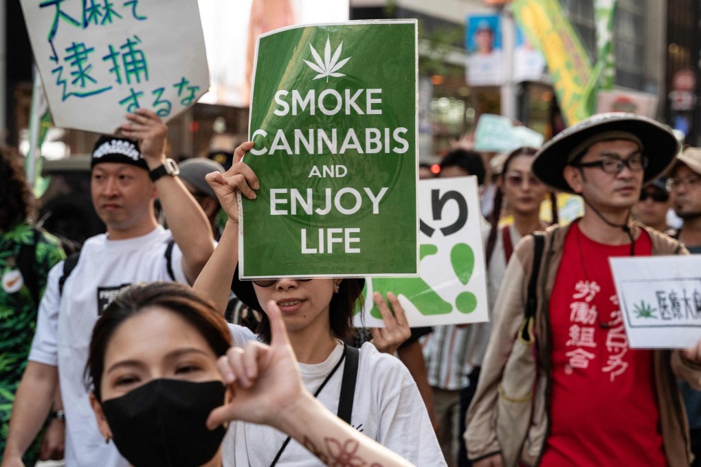 People take part in a march to call for the legalisation of cannabis in Tokyo. Photo: AFP
