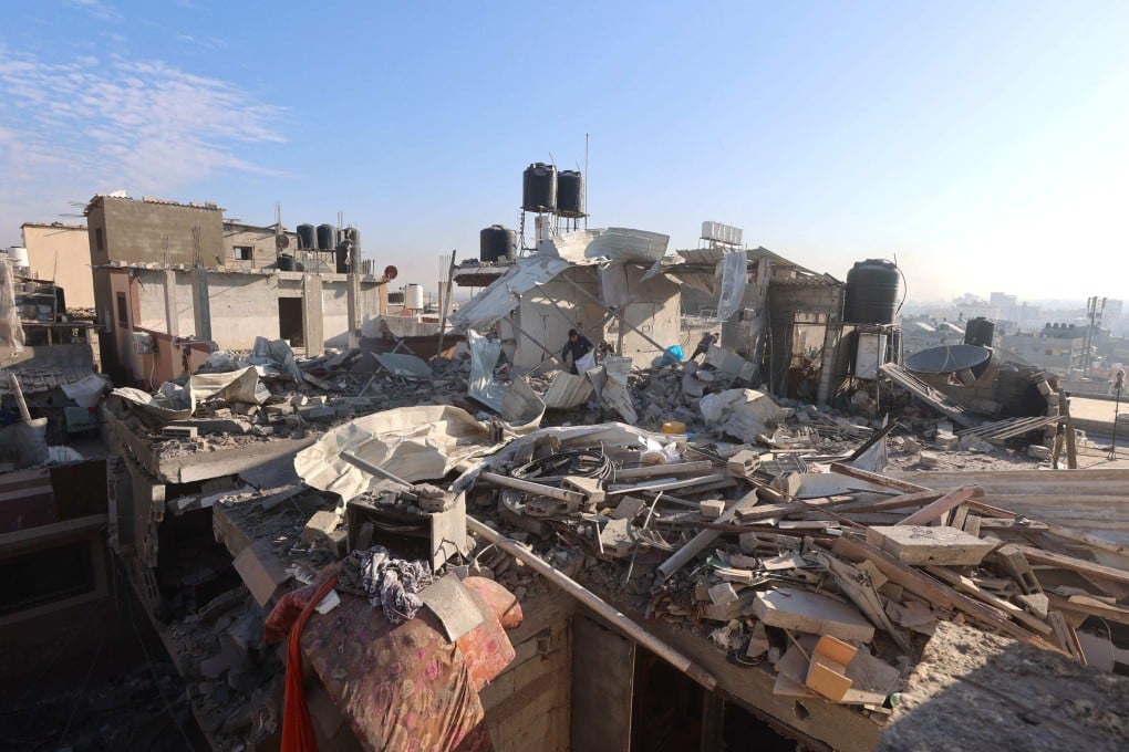 Palestinians check the rubble following Israeli bombardment on Khan Yunis. A jury of German experts has chosen “Krisenmodus” (crisis mode) as the 2023 word of the year, against a backdrop of war in Ukraine and the Middle East. Photo: AFP