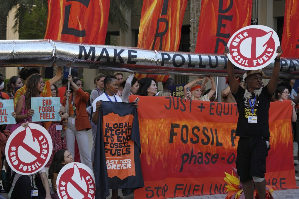 Activists protest against fossil fuels at the Cop28 summit in Dubai. Photo: AP