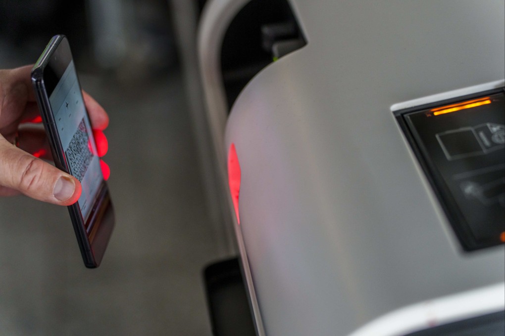 A QR code with travel data is read by a check-in machine. Frankfurt airport in Germany was the first airport in Europe to offer the option of biometric identity and identification verification at check-in. Photo: Getty Images