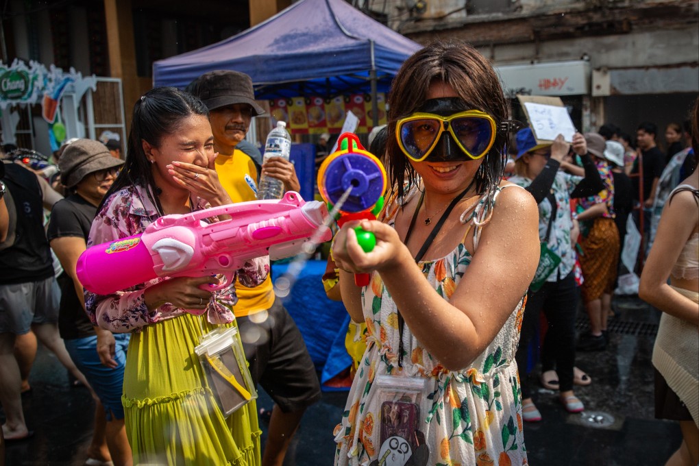 Thailand’s Songkran festival involves drenching others with buckets of water and water guns, and is a big tourist draw. An idea to extend the three-day event to a month is getting a mixed reception. Photo: Getty Images