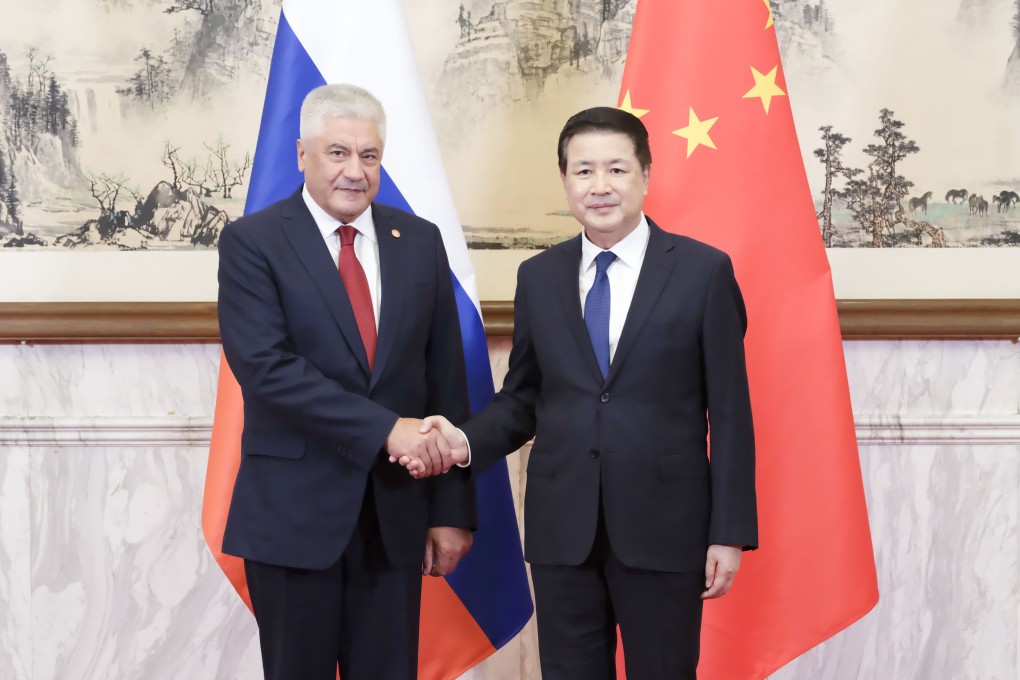 Chinese Minister of Public Security Wang Xiaohong (right) shakes hands with Russia’s Minister of Internal Affairs Vladimir Kolokoltsev in Beijing on Tuesday. Photo: Xinhua