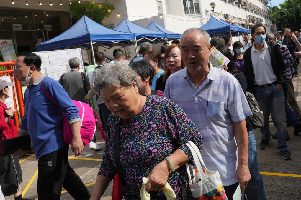 Voters line up to cast their ballots at a polling station in Sheung Shui during the district council election. Photo: Elson LI