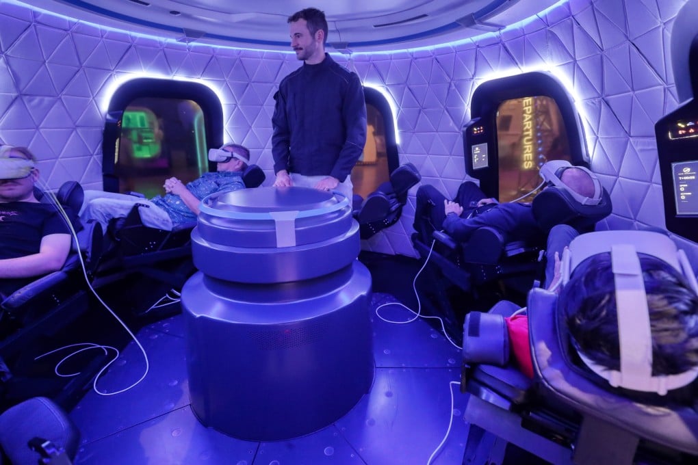 Astronaut trainer Barret Schlegelmilch stands in Blue Origin’s simulator of its New Shepard spacecraft at the Kennedy Space Centre visitor complex. The attraction is expected to bring the once-exclusive sensation of space travel to “a huge range of people”. Photo: TNS