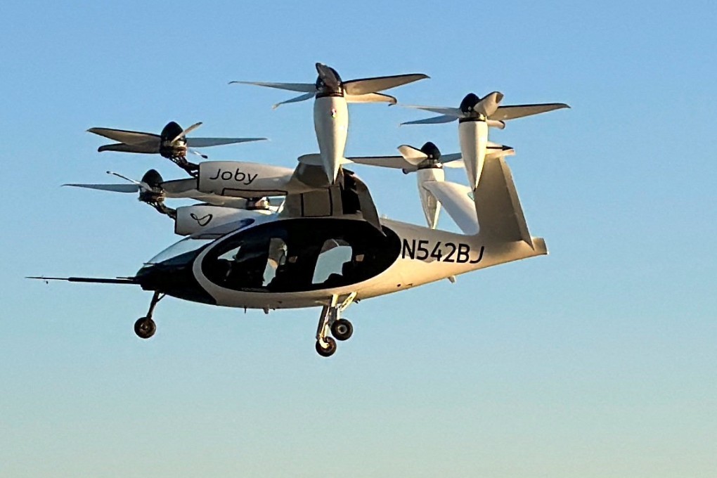 An electric air taxi by Joby Aviation flies near a heliport in Manhattan, New York, on November 12. Photo: Reuters