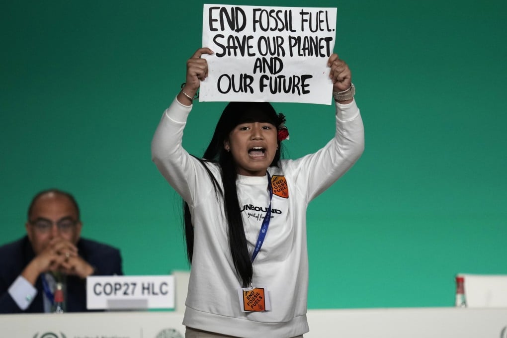 Climate activist Licypriya Kangujam came on stage at the Dubai summit to protest against the use of fossil fuels, before being ushered away. Photo: AP