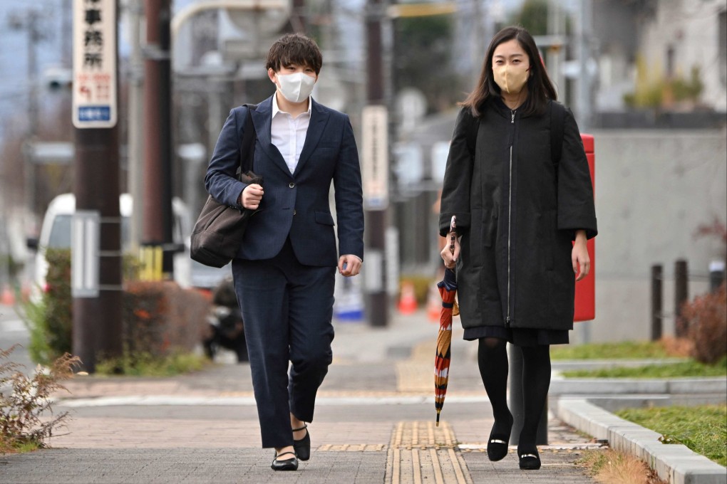 Rina Gonoi (left), a former member of Japan’s Ground Self-Defence Force, arrives on Tuesday at the Fukushima District Court, which found three ex-soldiers guilty of sexually assaulting her. Photo: AFP