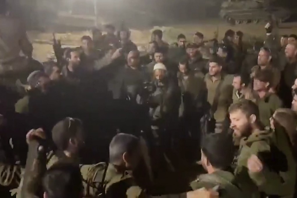 This image made from an undated video shared on X shows Israeli troops chanting racist slogans as they dance in a circle in Gaza. Photo: X via AP