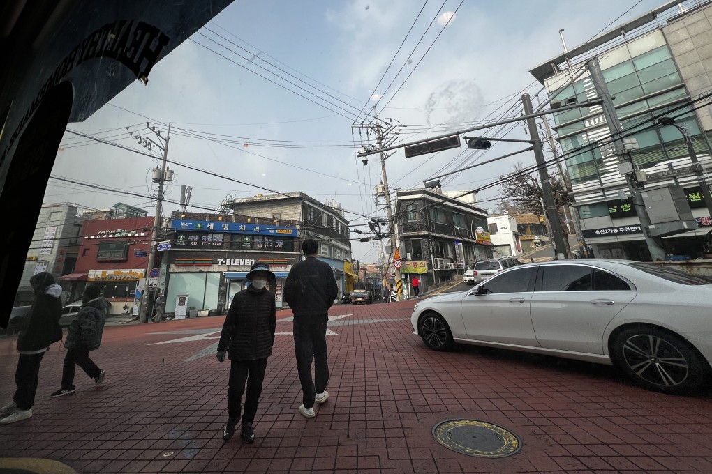 A five-way intersection in Haebangchon, one of Seoul’s last “moon villages”, sees the roads that go up and down Namsan mountain and through Haebangchon meet. ​​There are no traffic lights for cars or pedestrians, but somehow it works. Photo: Erika Na