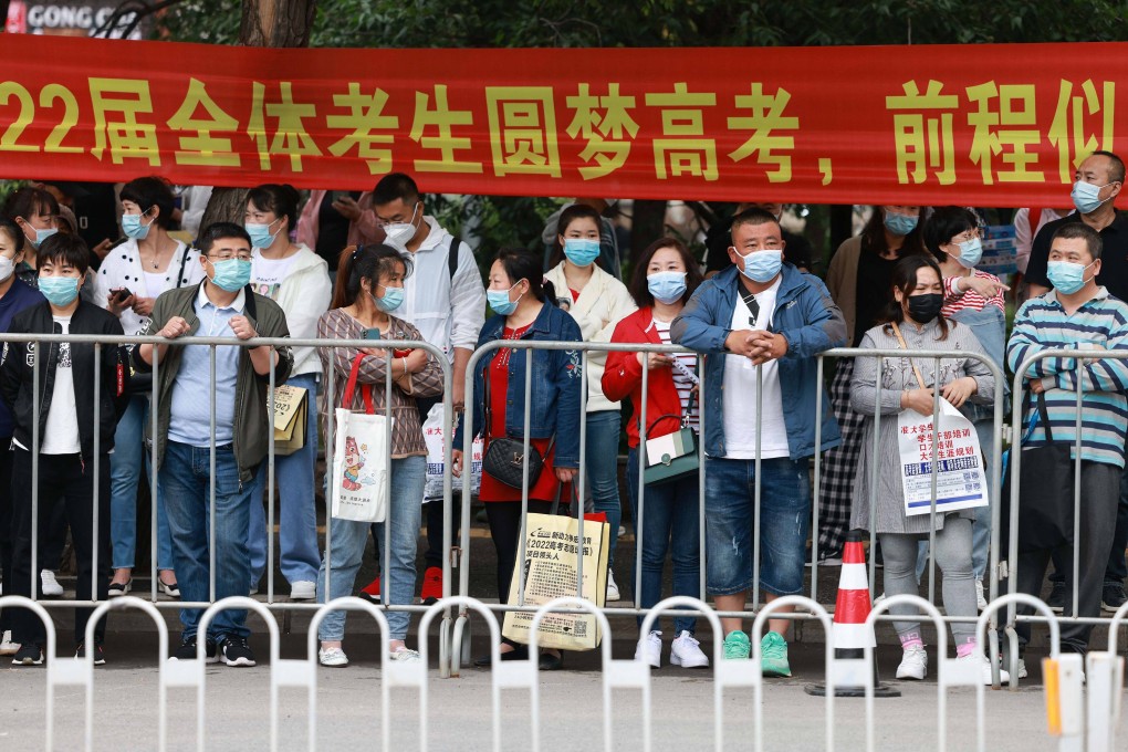 Parents wait outside a school on the first day of the national college entrance examination in Shenyang in China’s northeastern Liaoning province on June 7, 2022. Since 2017, China’s education ministry has been aiming to stream at least 50 per cent of students towards vocational schools, making it harder to secure a place in university. Photo: AFP
