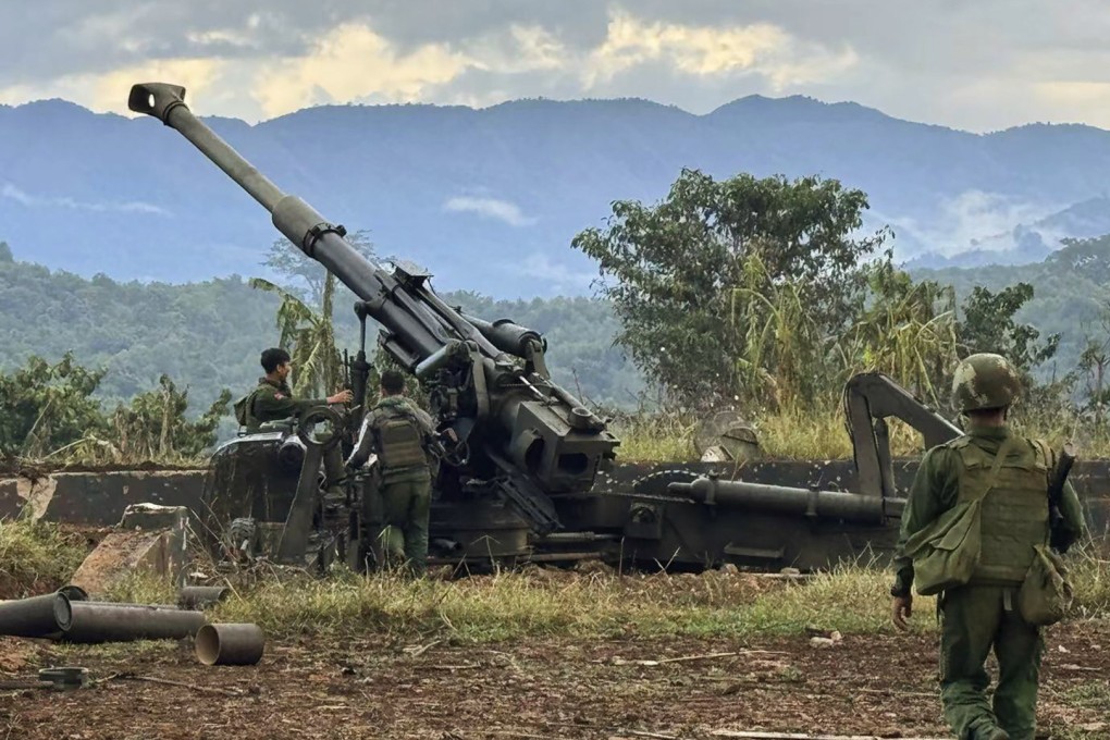 Members of one of the three militias, known as the Three Brotherhood Alliance, check weapons. The group has agreed to a temporary ceasefire with the military junta after talks brokered by China. Photo: AP