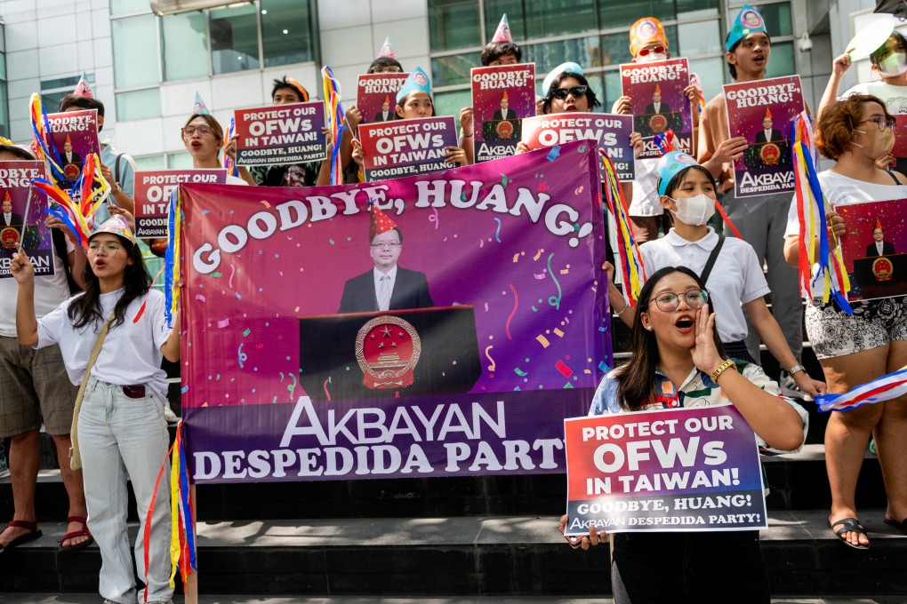 Filipino activists hold placards calling for the removal of Chinese Ambassador to the Philippines Huang Xilian in Makati City, Metro Manila, the Philippines, in April. Photo: Reuters