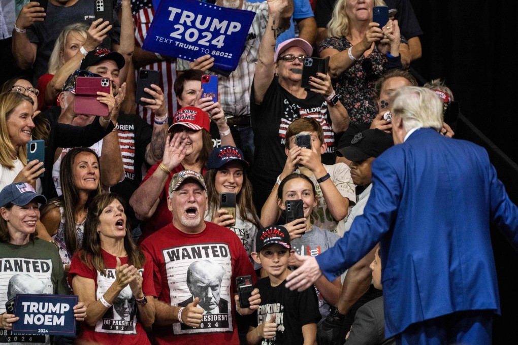 Former US president and 2024 Republican presidential hopeful Donald Trump gestures as he leaves the stage after speaking during a rally in Rapid City, South Dakota, on September 8. Photo: AFP