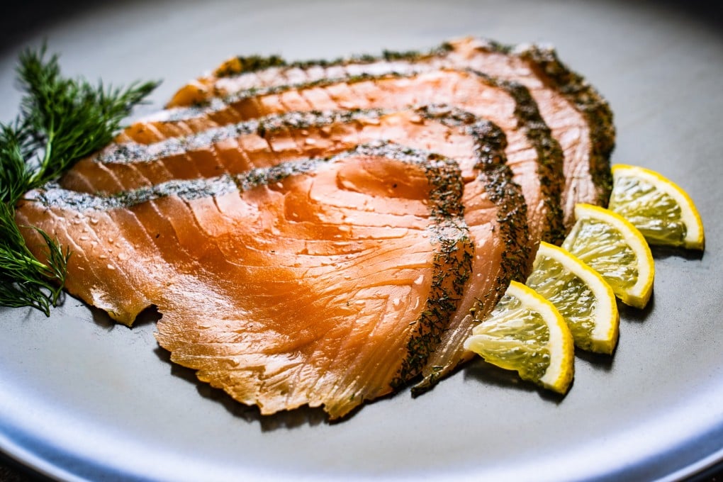 Smoked salmon with dill and lemon. Not all smoked salmon is cooked, and that means it needs handling with care and that some people should avoid eating it, according to food safety experts. Photo: Shutterstock