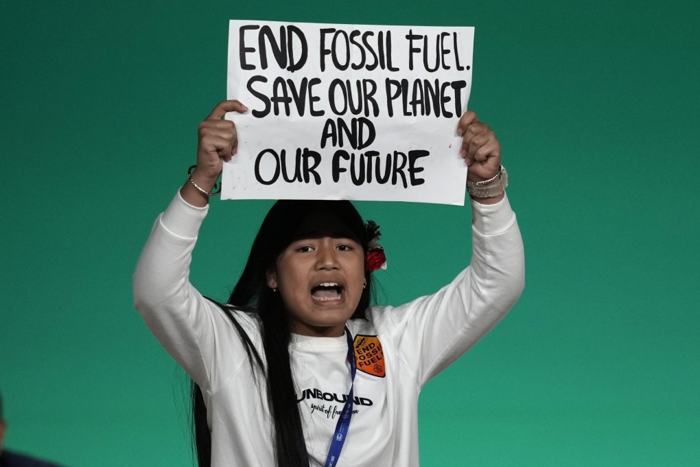 Licypriya Kangujam, a young environmental activist from India, protests against the use of fossil fuels during an event at Cop28 on December 11 in Dubai. Photo: AP