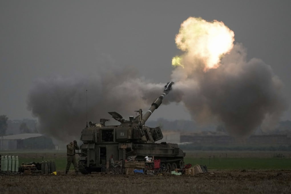 An Israeli mobile artillery unit fires a shell from southern Israel towards the Gaza Strip on Thursday. Photo: AP