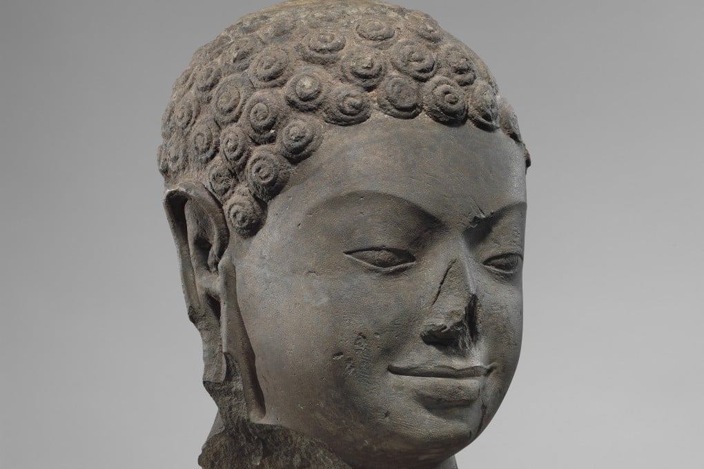 A larger-than-life Buddha head from the 7th century at the Metropolitan Museum of Art in New York. Photo: Metropolitan Museum of Art via AP