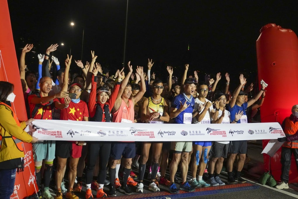 Runners wait at the start line ahead of the marathon race in the 2023 Hong Kong Streetathon. Photo: Sam Tsang
