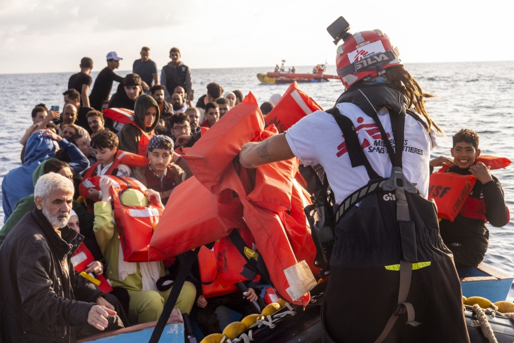 Migrants are rescued off the coast of Libya in October. Libya and Tunisia are principal departure points for migrants risking dangerous sea voyages in hopes of reaching Europe. Photo: AP
