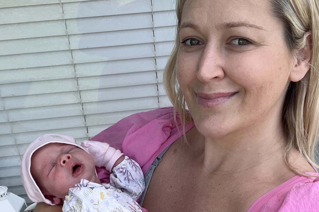 New mother Kellie Johnson with her weeks-old baby, Lola, born against the odds after her years of suffering with endometriosis. Photo: Kellie Johnson