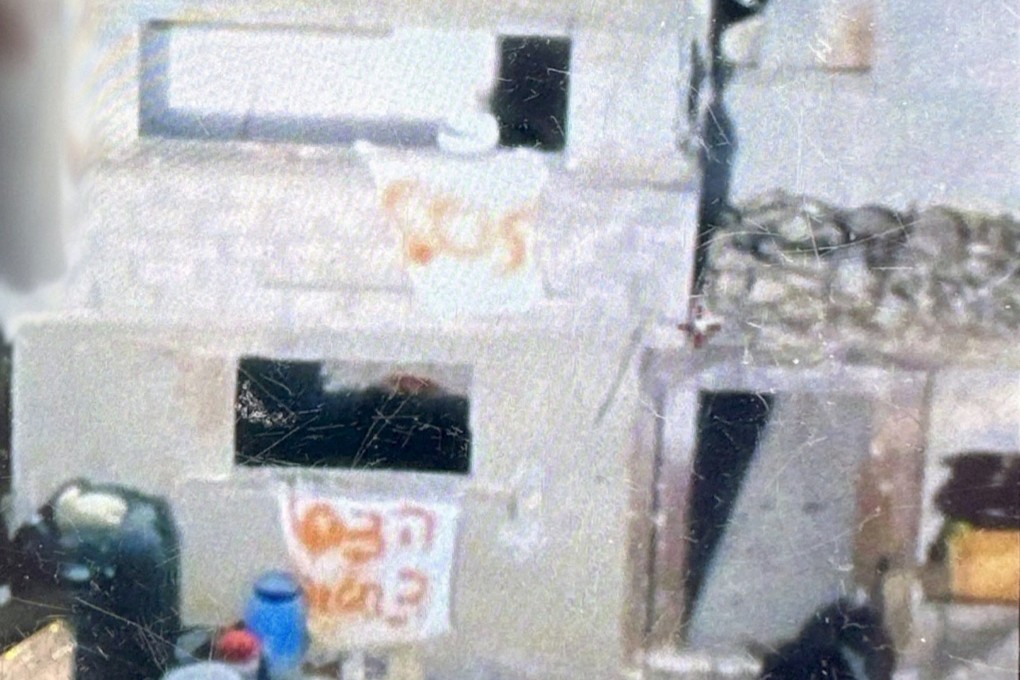 Signs reading ‘Help, three hostages’ in Hebrew and ‘SOS’ found on a Gaza building where the three Israeli hostages had been hiding. Photo: Israel Defence Forces via Reuters