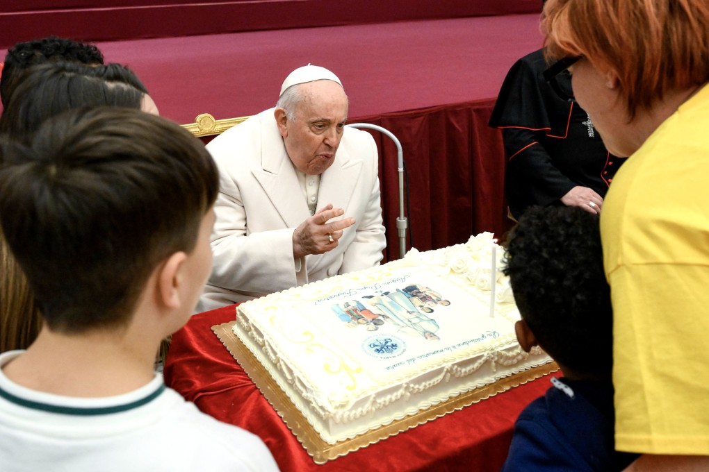 Pope Francis is presented with a birthday cake during an audience with the children of Santa Marta Paediatric Dispensary at the Vatican, Rome on Sunday. Photo: EPA-EFE / Vatican Media Handout