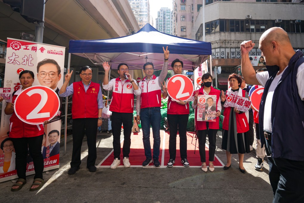 Members of the Hong Kong Federation of Trade Unions canvassing for support at North Point during the District Council Election. Photo: Sam Tsang