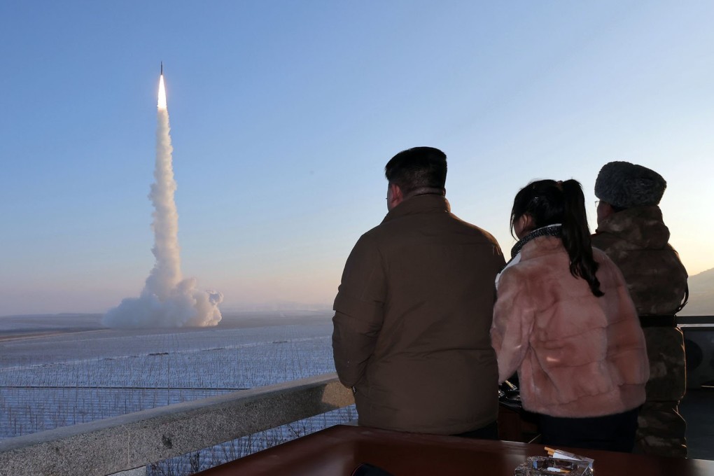North Korean ruler Kim Jong-un (left) and his daughter Ju-ae (second from left) watch Monday’s test launch in this pictured released by state media. Photo: KCNA/KNS/dpa