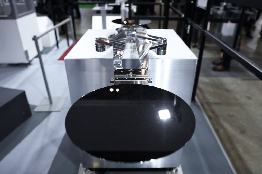 A Rorze vacuum wafer robot is displayed at the Semicon Japan exhibition in Tokyo, Dec. 13, 2023. Photo: Bloomberg