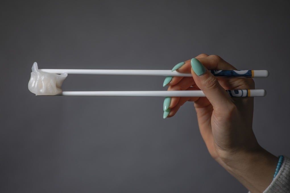 The correct way to hold chopsticks - Post writer Erika Na demonstrates how to eat with them. Photo: Antony Dickson