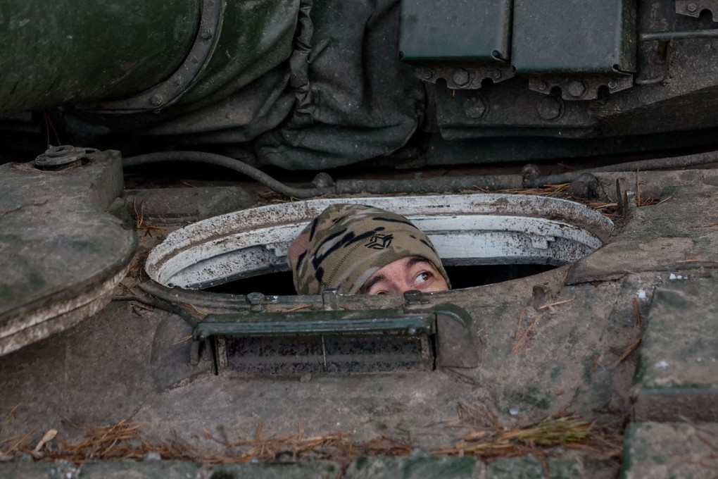 A Ukrainian serviceman in a T-72 main battle tank. Ukraine has been at war with Russian troops since February 2022.  Photo: Reuters