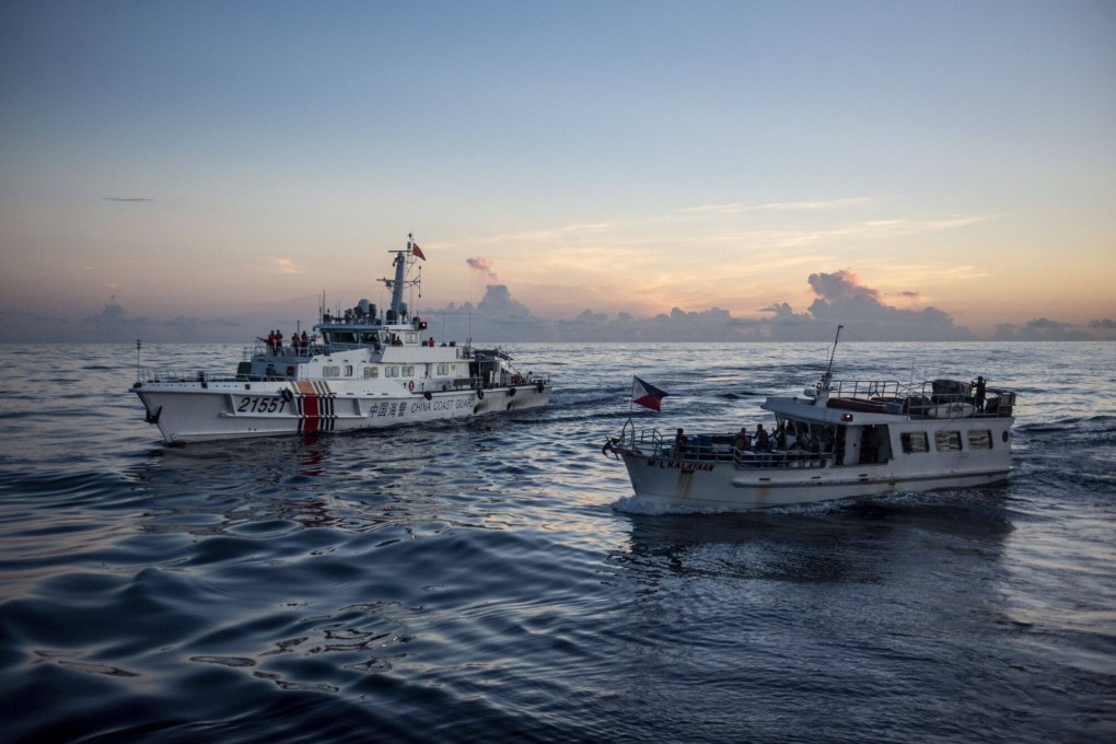 The Philippines’ military-chartered boat ML Kalayaan encounters a China Coast Guard ship during a resupply mission for the BRP Sierra Madre, in the Second Thomas Shoal in the disputed South China Sea, on November 10. Photo: Bloomberg