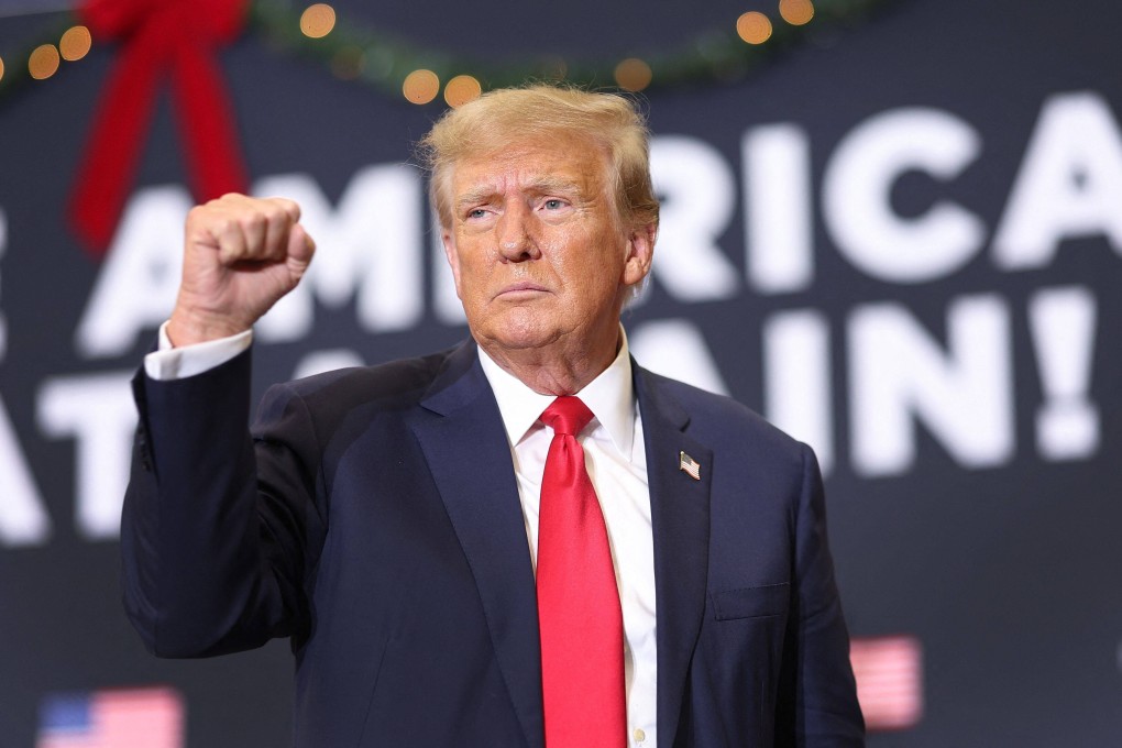 Former US president Donald Trump gestures as he wraps up a campaign event in Waterloo, Iowa, on Tuesday. Photo: AFP