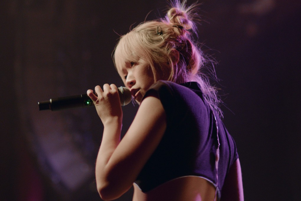 Tiffany Day performing on stage during her self-funded, self-programmed North America tour. The Chinese-American musician opens up about her motivations and finding herself in music, following the release of an award-winning film about the tour. Photo: Henry Thong