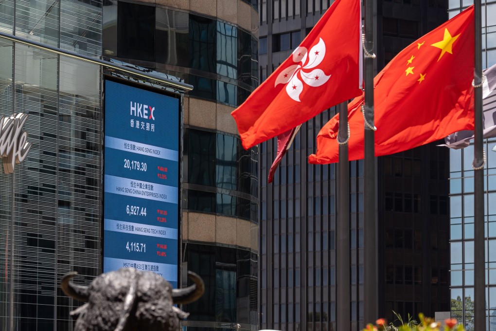 An electronic board displays the latest stock and index levels outside the Exchange Square in Central, Hong Kong in May 2022. Photo: EPA-EFE