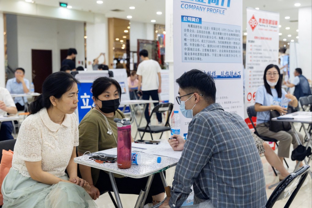A job fair in Beijing. Chinese graduates both at home and abroad are facing difficulties finding employment that fits their career expectations. Photo: Reuters