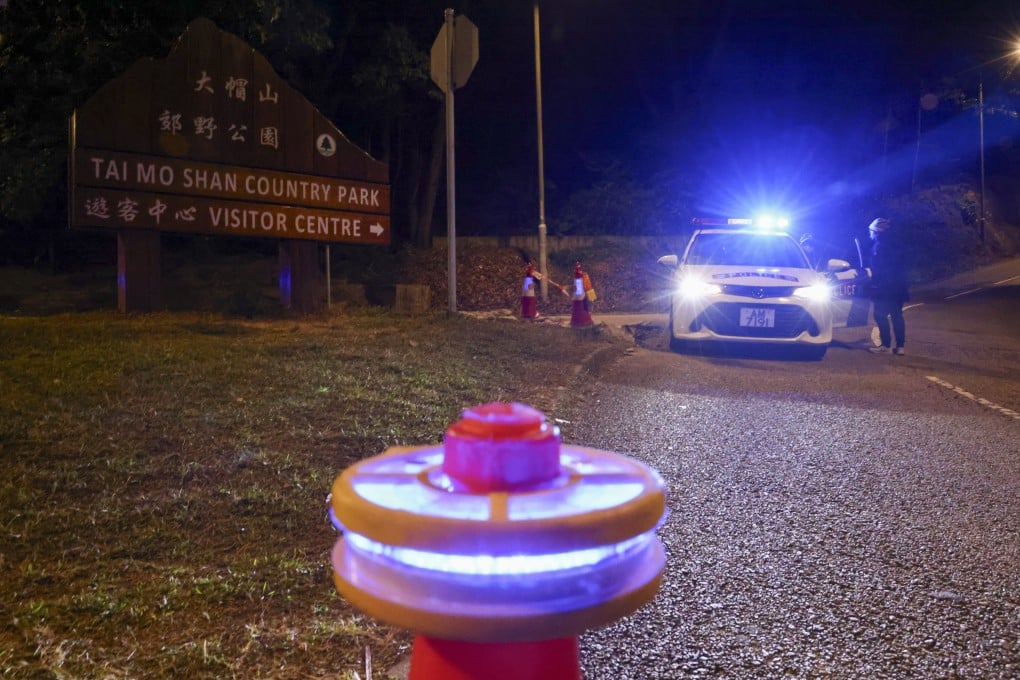 A police car at Tai Mo Shan. The missing hiker last spoke to officers around 4pm on Thursday. Photo: Dickson Lee