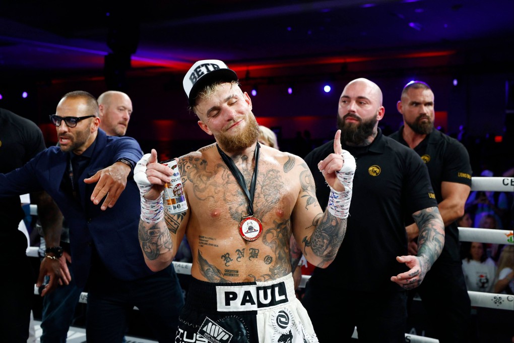Jake Paul celebrates after knocking out Andre August in the first round of their on December 15 in Orlando, Florida. Photo: Getty Images