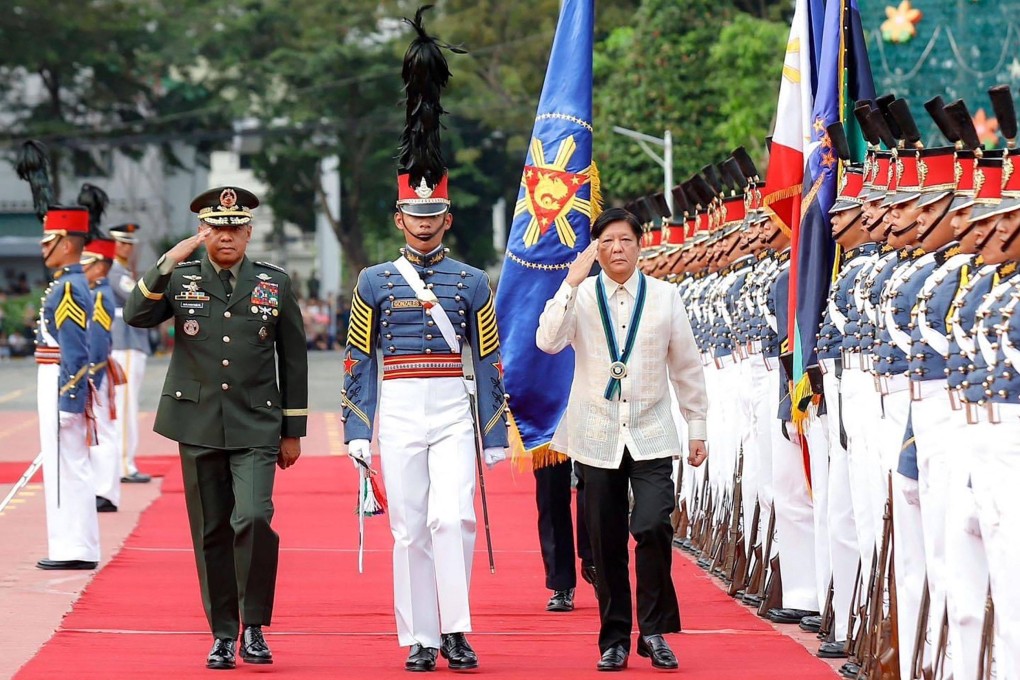 Philippines President Ferdinand Marcos Jnr (right) inspects troops during the 88th anniversary of the Armed Forces of the Philippines at Camp Aguinaldo in Quezon city. Photo: PCO/AFP