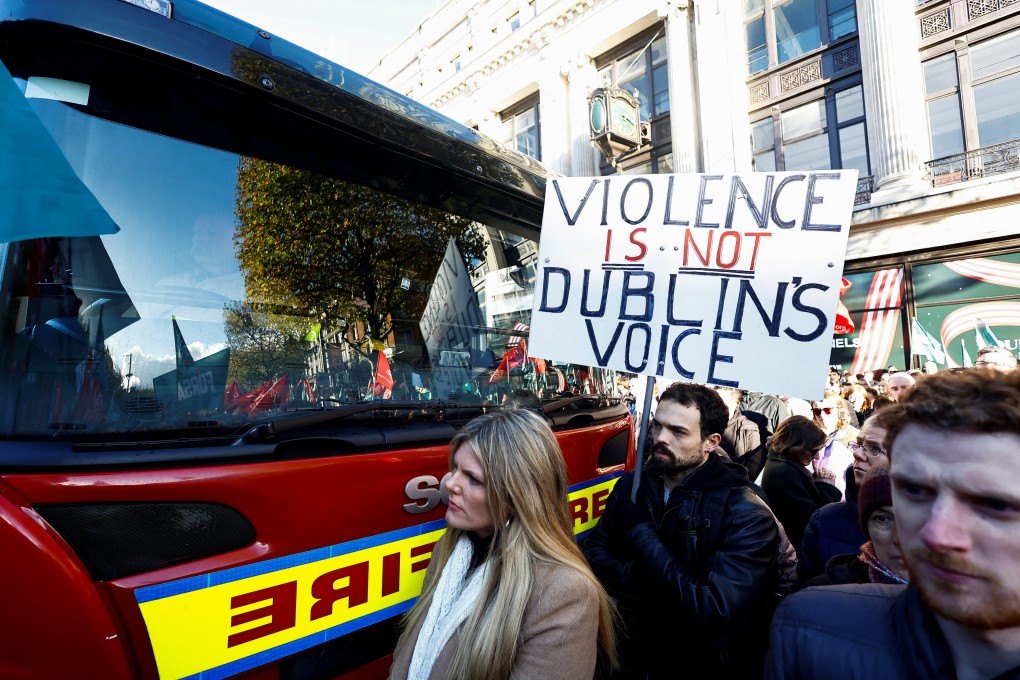 Protesters attend a vigil denouncing violence, following the stabbing of children in Dublin, Ireland on November 27. On Thursday a 50-year-old man was charged with attempted murder over the school attack. Photo: Reuters