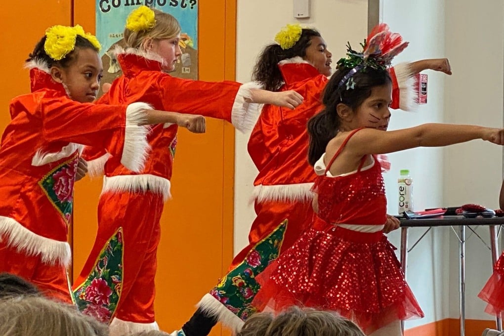 Yu Ying Public Charter School students in Washington DC perform a Chinese song and dance. Between public and private schools, Mandarin immersion programmes can be found in 32 US states. Photo: Yu Ying Public Charter School