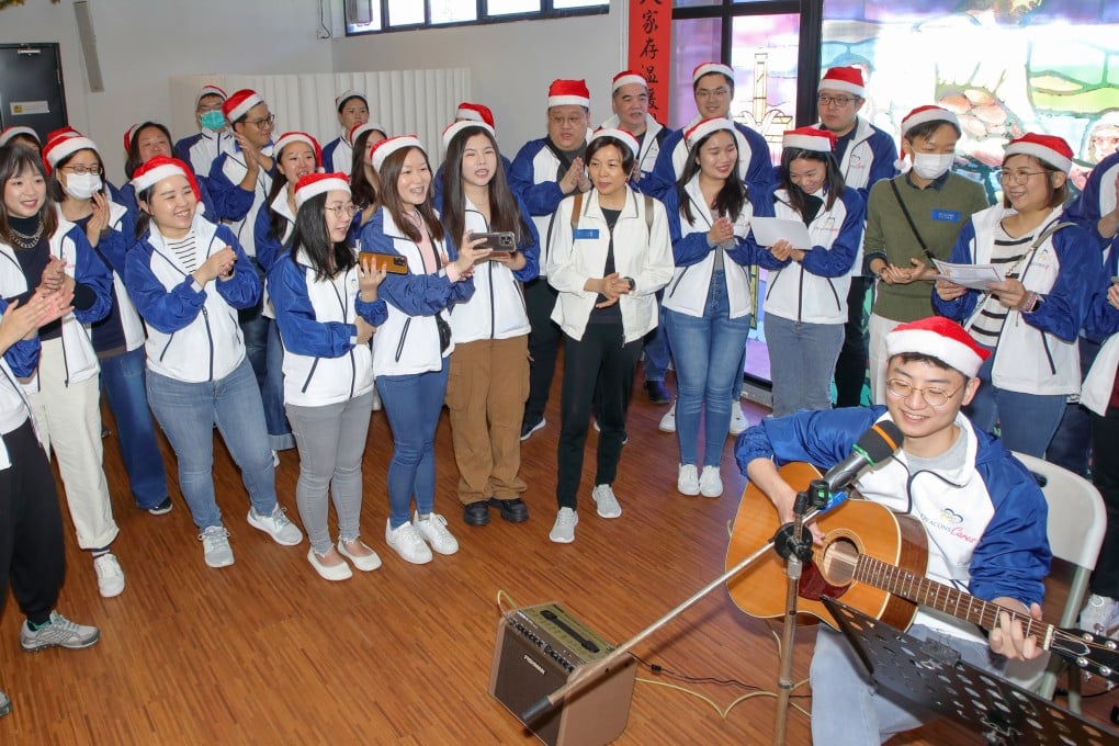 The volunteers from Deacons also put on a music show at the Meals for Seniors Day at Saint Barnbas’ Society and Home. Photo: Bharat Khemlani