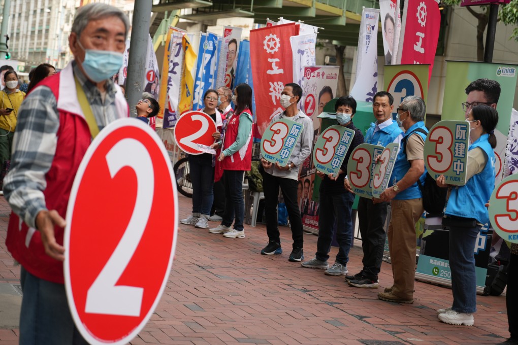 Campaign team canvassing during the District Council Election Day at Quarry Bay. Photo: SCMP / Sam Tsang