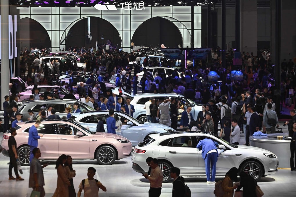 People visit an Aito booth during the 20th Shanghai International Automobile Industry Exhibition in Shanghai on April 19, 2023. Photo: AFP