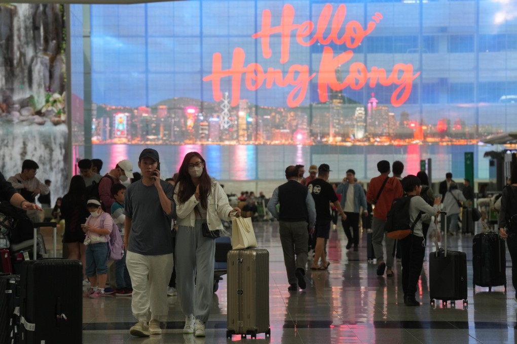 People arrive at Hong Kong international airport on April 10. It will take time to see how attractive the city’s new visa scheme is to high-net-worth individuals. Photo: Sam Tsang