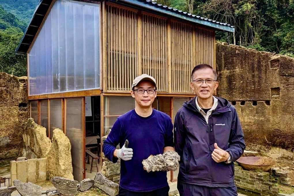 Thomas Chung (left), associate professor at the Chinese University of Hong Kong School of Architecture, and Tsang Yuk-on, village representative of Mui Tsz Lam, at the revitalised Hakka village near the mainland China border. Photo: 
Wong Kam-sing, former Hong Kong secretary for the environment and ecology
