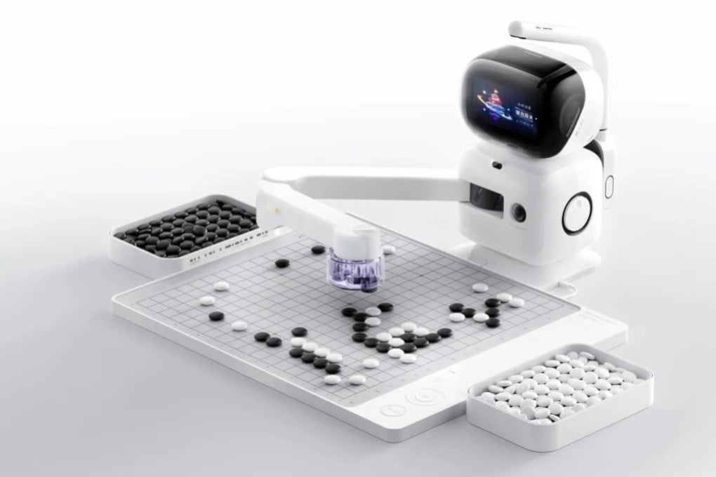 The SenseTime AI Go robot is equipped with a robotic arm, display screen and a board. Photo: Handout