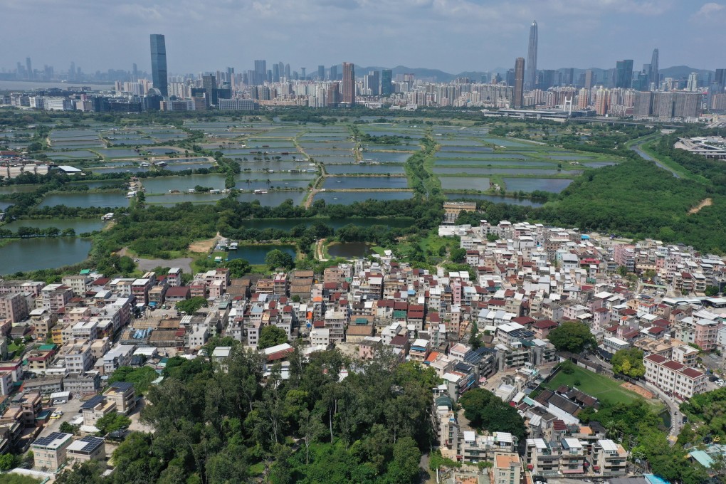 An aerial view of the San Tin area in the New Territories North, with wetlands and Shenzhen seen in the distance. Photo: Winson Wong